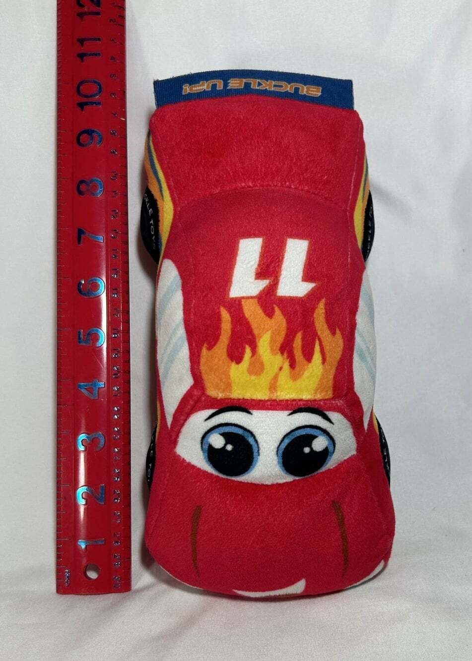 Red Race car buckle learning plush toy with zipper